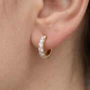 F136 Titanium Moissanite Huggie Hoop Earrings - worn on ear