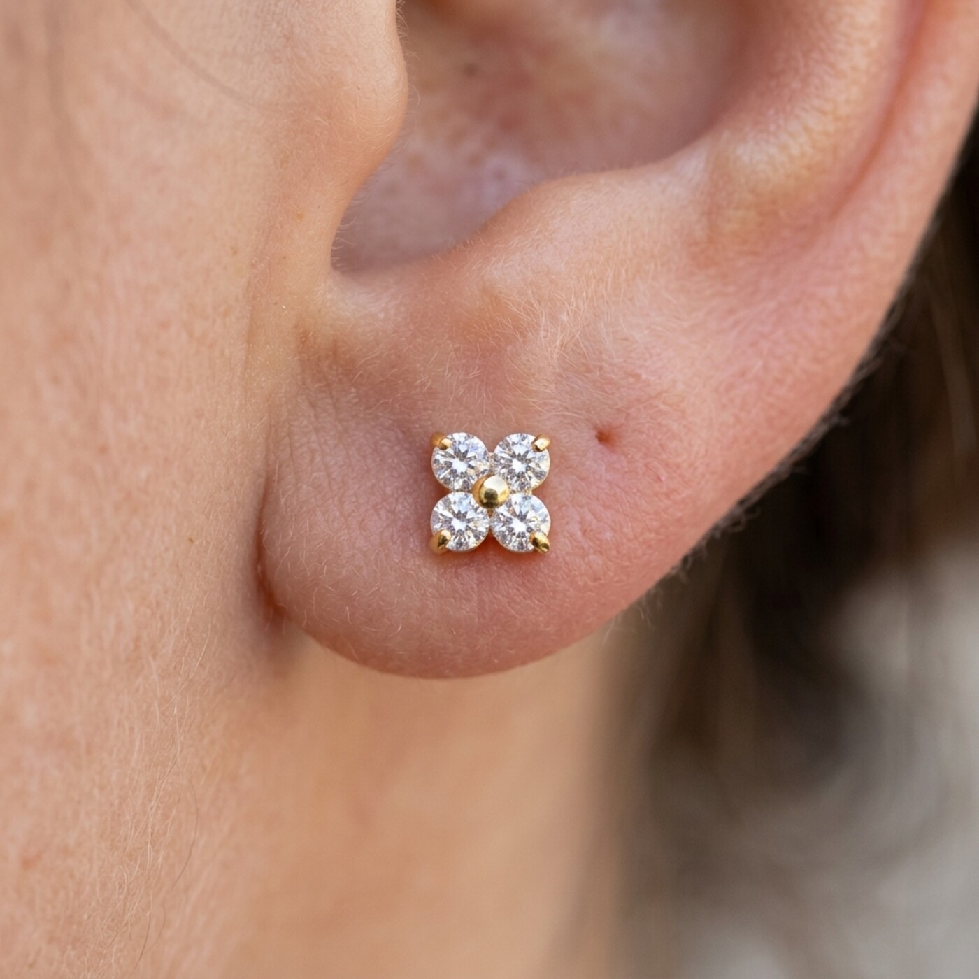 Flat Back Stud Earrings Crystal Flower in F136 Titanium - worn on ear
