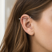 G23 Titanium Double Chain Industrial Barbell Earring worn on ear in clean window daylight