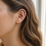 G23 Titanium Bunny Crystal Industrial Barbell Earring in Silver worn on ear in clean window daylight