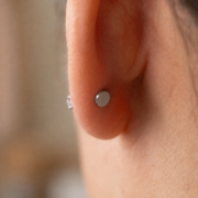 Titanium Stud Earrings Crystal Clear for Sensitive Ears - corrected on-ear product image