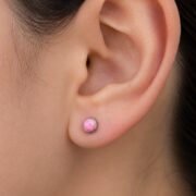 Titanium Stud Earrings Flat Round Starter for Sensitive Ears worn on one ear