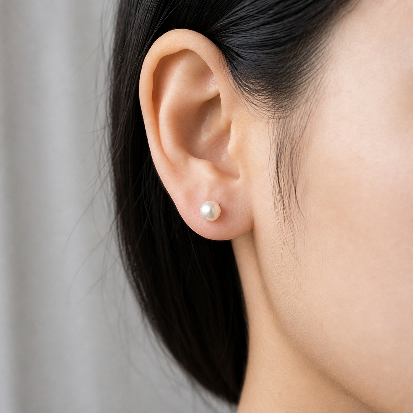 Titanium Pearl Stud Earrings Classic for Sensitive Ears worn on one ear