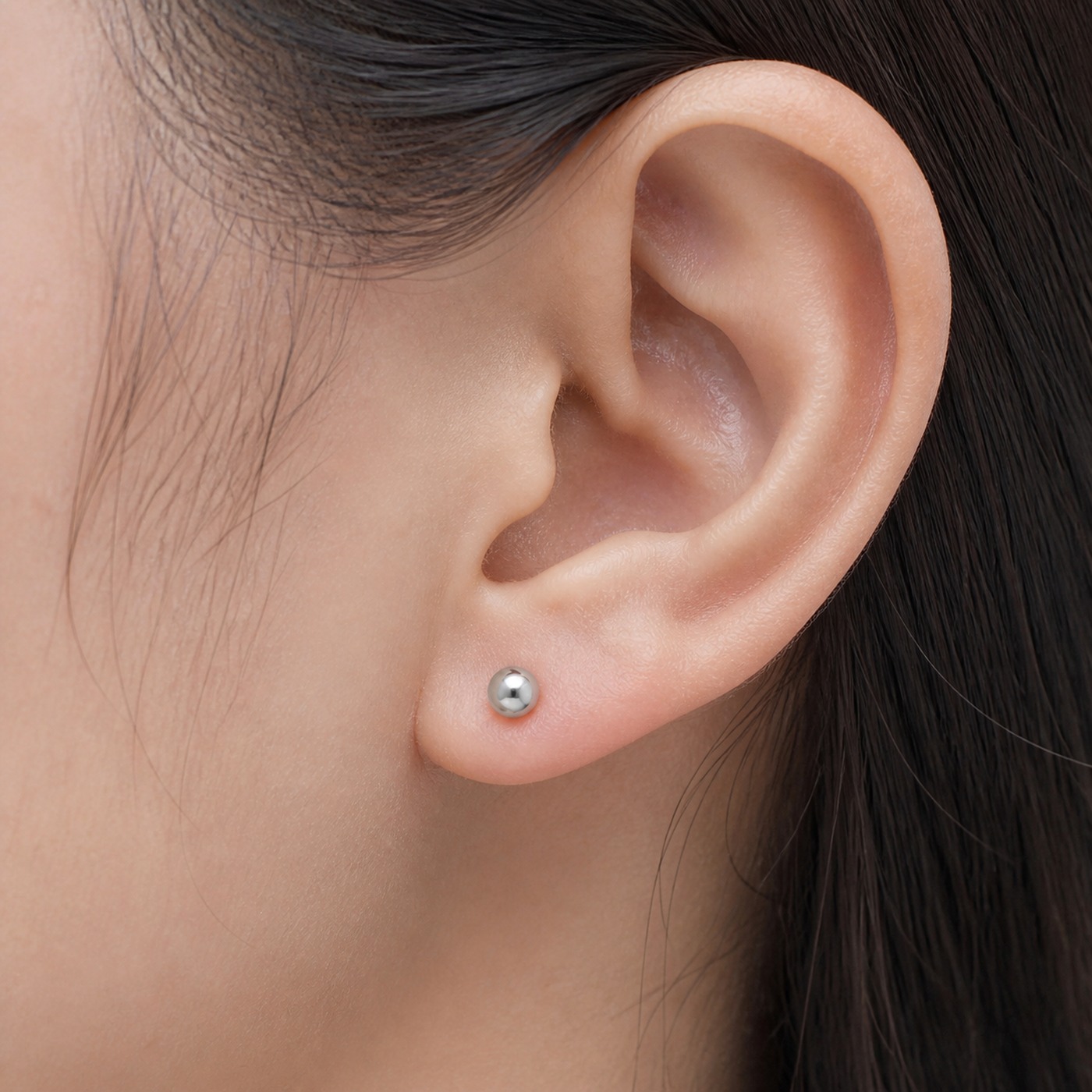 Titanium Ball Stud Earrings Polished Round for Sensitive Ears worn on one ear