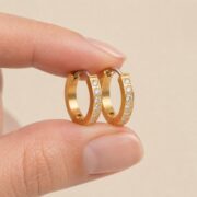 Hypoallergenic Hoop Earrings Date Night with S925 Silver shown at fingertip scale