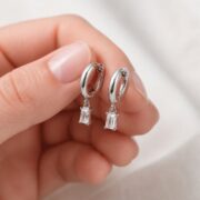 Titanium Hoop Earrings Maya Crystal Gemstone for Sensitive Ears shown at fingertip scale