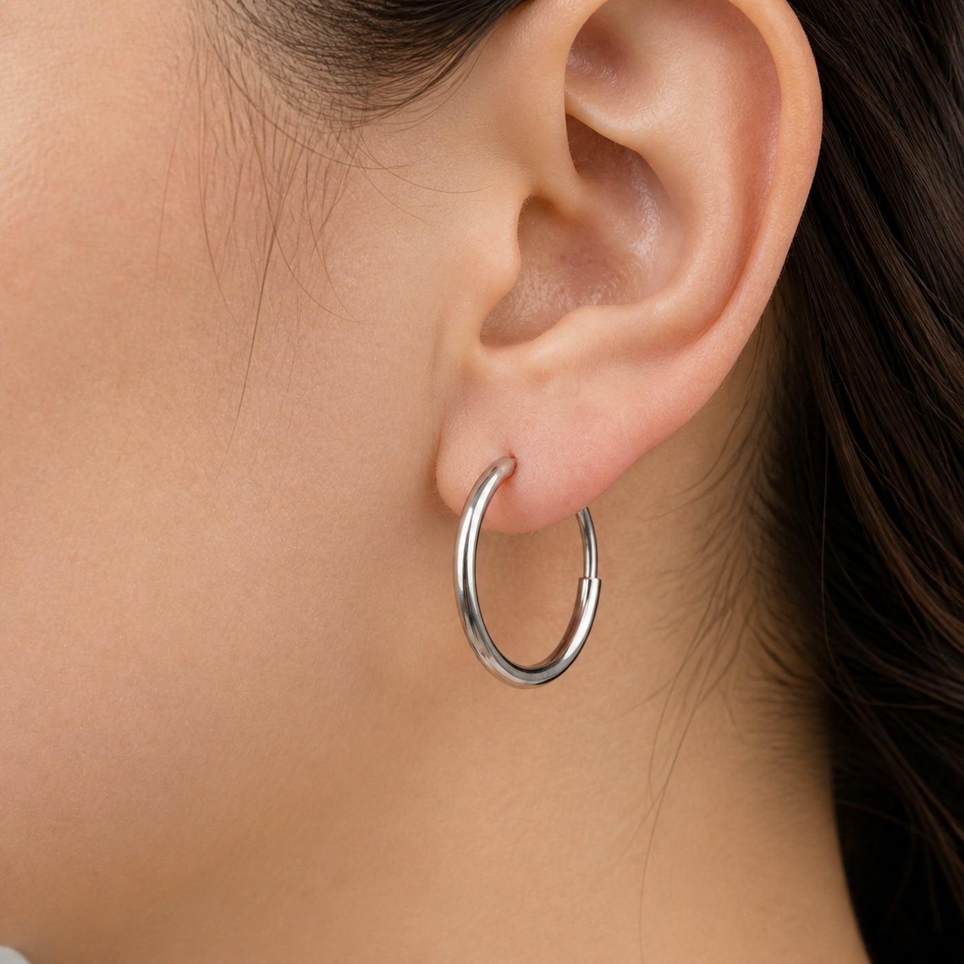 Titanium Hoop Earrings Classic Natural Titanium for Sensitive Ears worn on one ear
