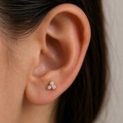 Flat Back Stud Earrings Pave Astrid in F136 Titanium worn on one ear