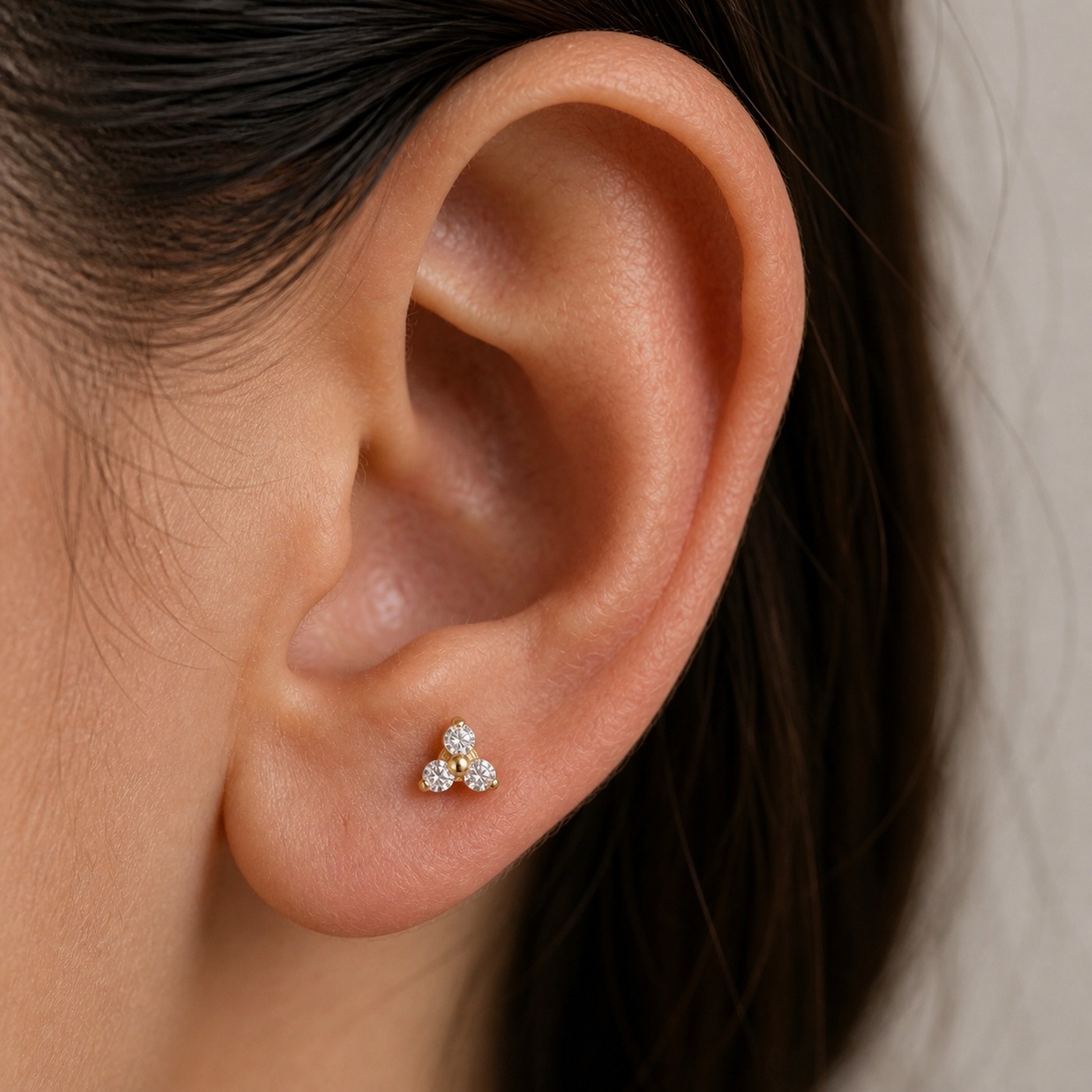 Flat Back Stud Earrings Pave Astrid in F136 Titanium worn on one ear
