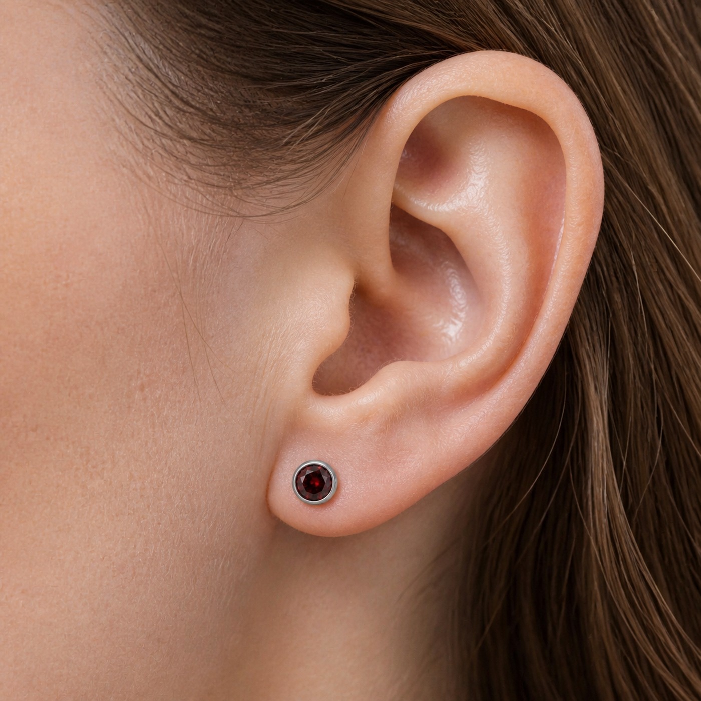 Flat Back Stud Earrings Micro Birthstone in F136 Titanium worn on one ear