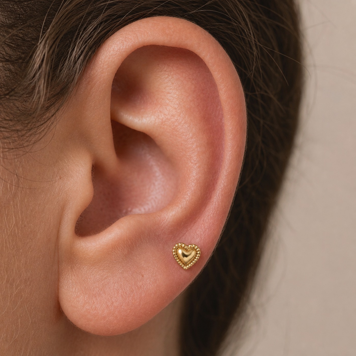 Flat Back Stud Earrings Pillow Heart in Titanium worn on one ear
