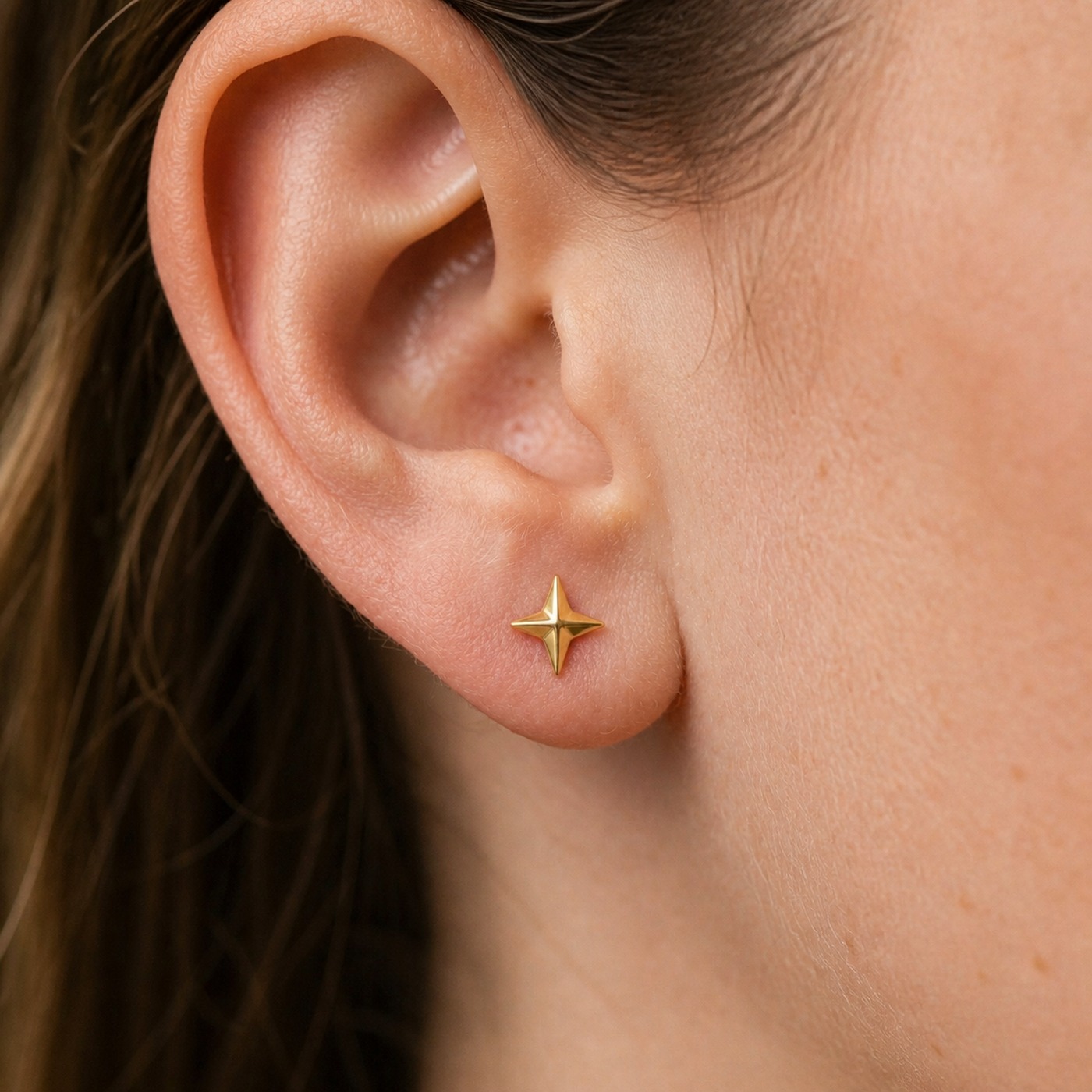 Flat Back Stud Earrings Twinkle Star in F136 Titanium worn on one ear