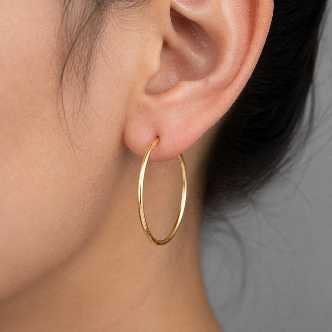 Hypoallergenic Hoop Earrings Every Body with S925 Silver worn on one ear