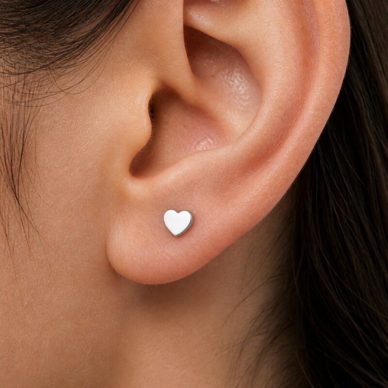 Flat Back Stud Earrings Classic Heart in F136 Titanium worn on one ear