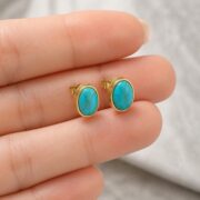 Stud Earrings Turquoise Vintage Oval with S925 Silver shown at fingertip scale
