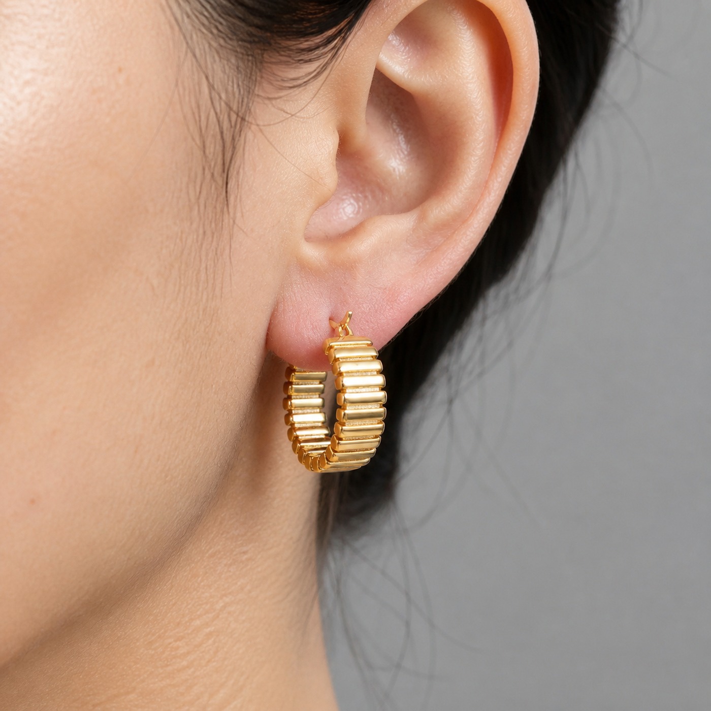 Hypoallergenic Hoop Earrings Textured Chunky with S925 Silver worn on one ear