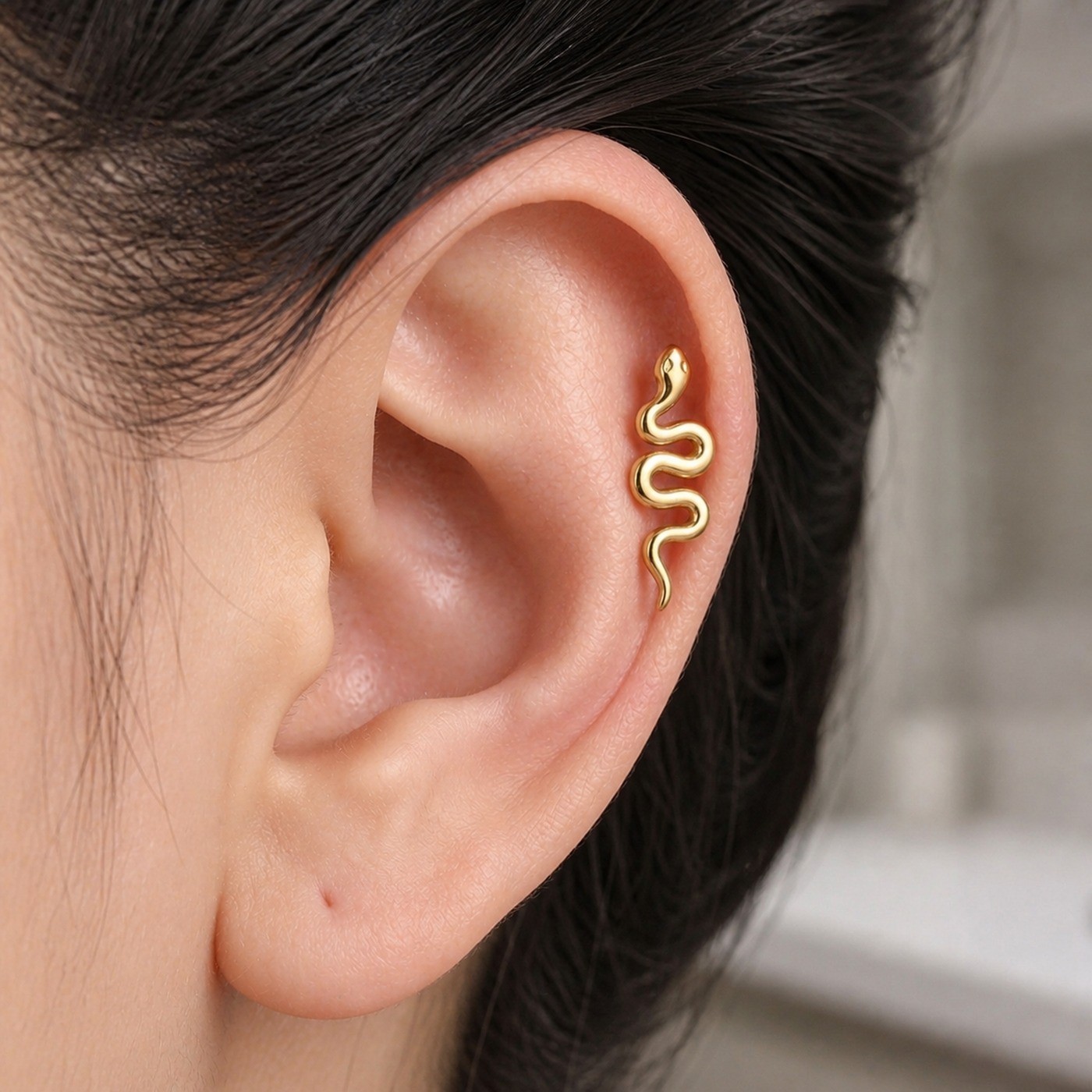 Flat Back Stud Earrings Snake in F136 Titanium worn on one ear