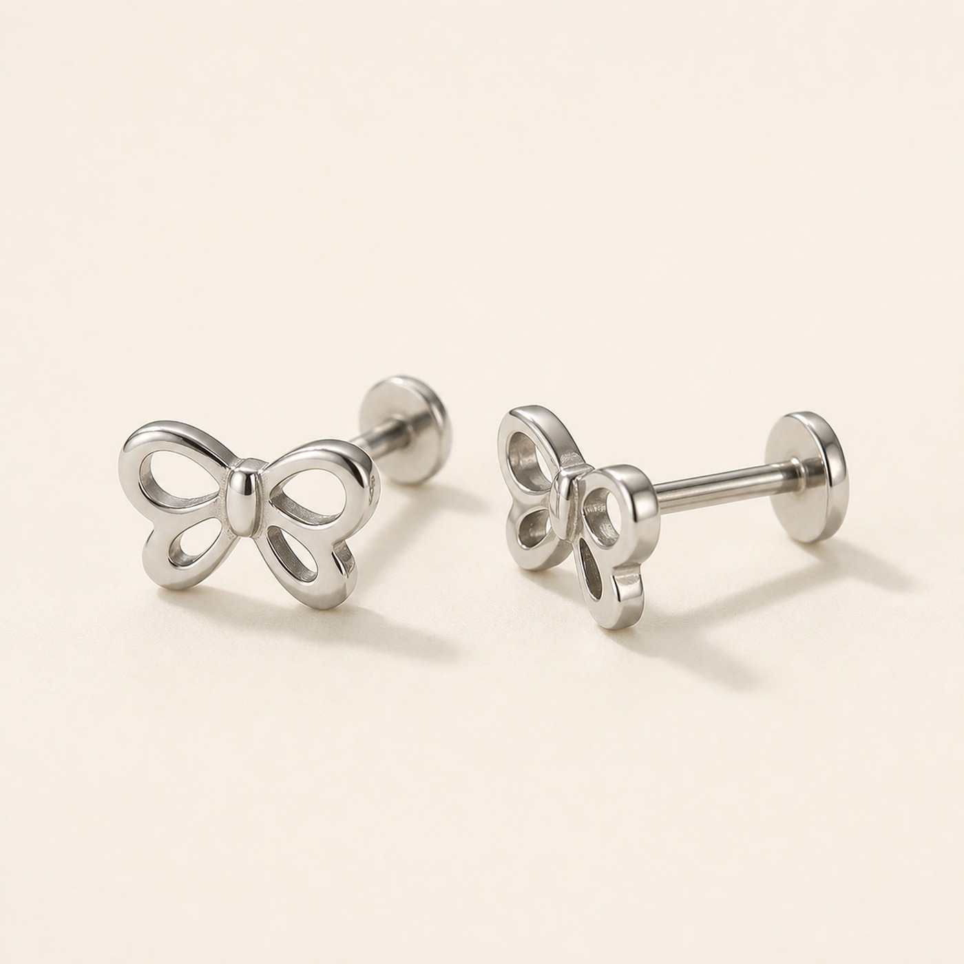 Titanium Stud Earrings Mini Bow in F136 Titanium product view