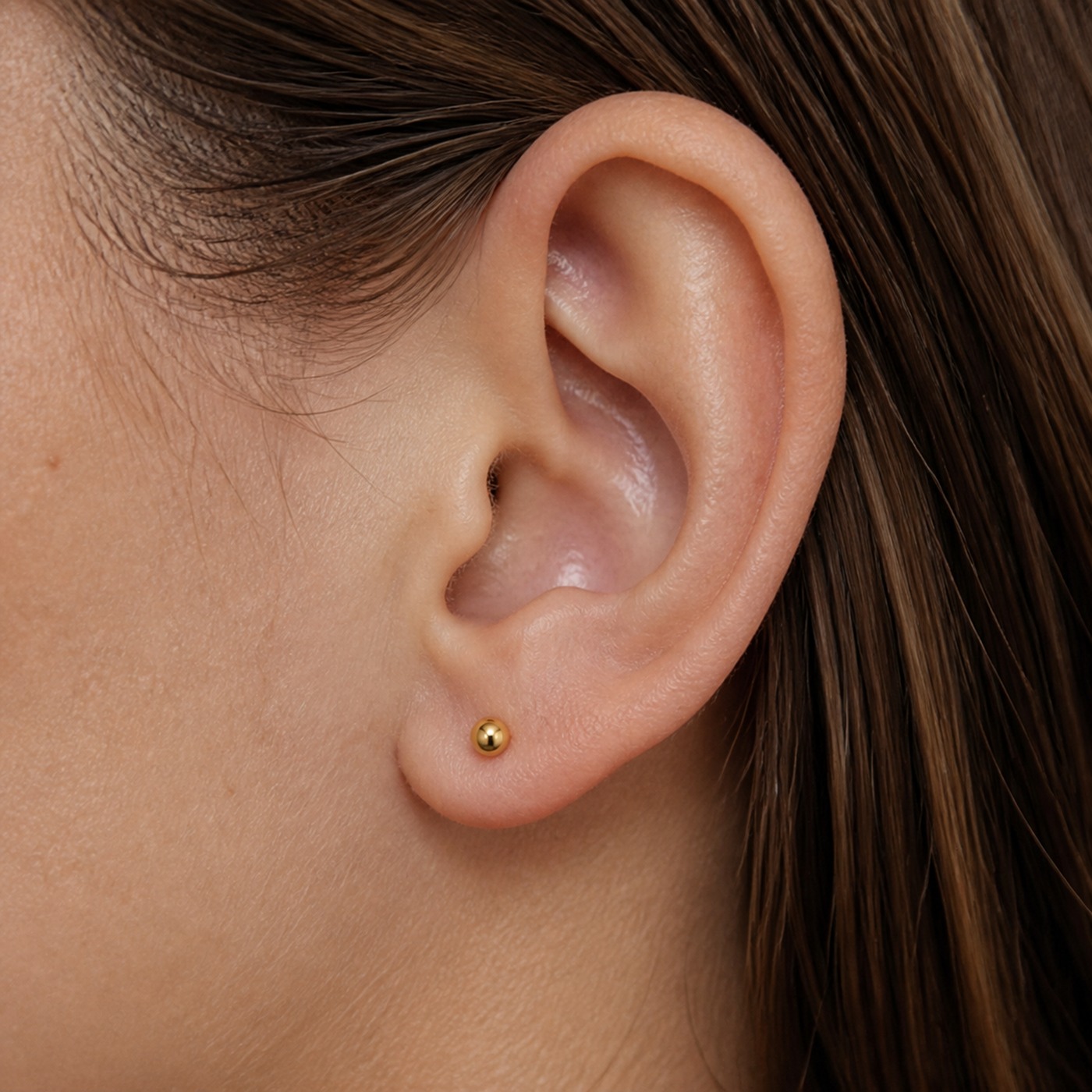 Flat Back Stud Earrings Val Polished Ball Ear in F136 Titanium worn on one ear