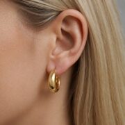Titanium Hoop Earrings Brandy Chunky Dome Polished for Sensitive Ears worn on one ear