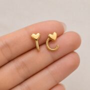 Hypoallergenic Hoop Earrings Heart with S925 Silver shown at fingertip scale