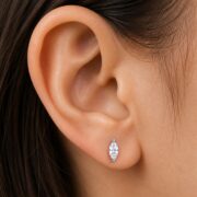 Titanium Stud Earrings Sparkly Marquise in Natural Titanium worn on one ear