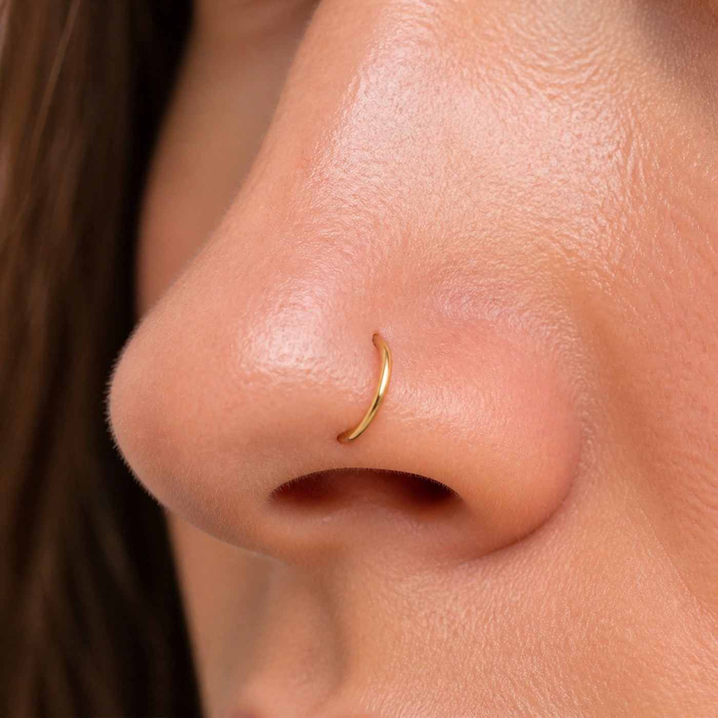 Nose Rings Minimal in F136 Titanium worn on one ear