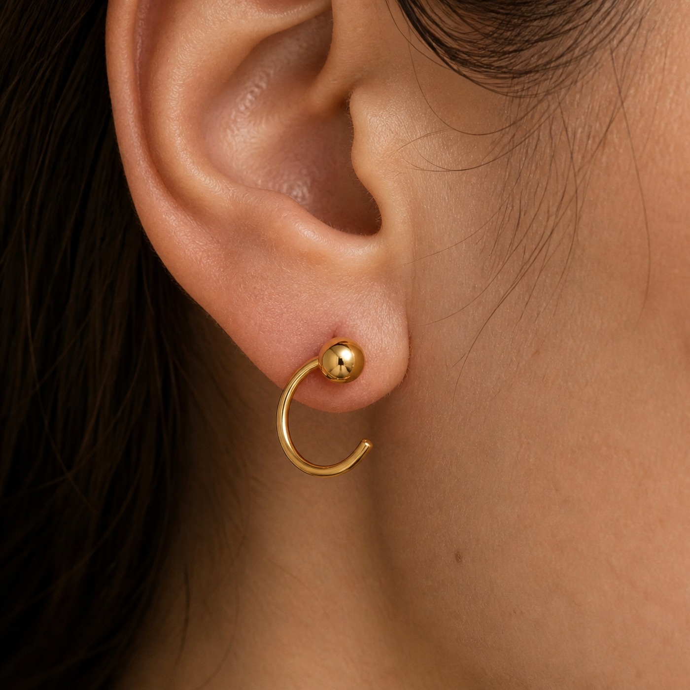 Hypoallergenic Hoop Earrings Ball with S925 Silver worn on one ear