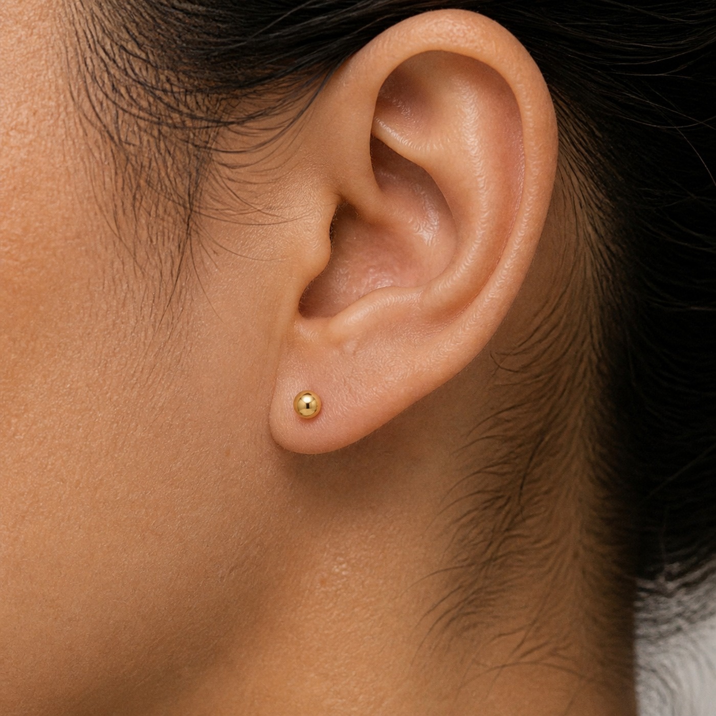 Stud Earrings Ball with S925 Silver worn on one ear