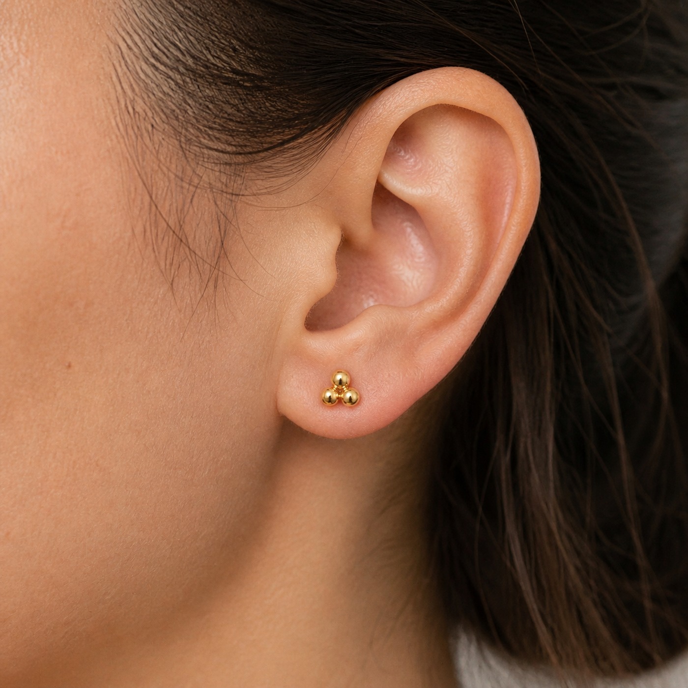 Titanium Stud Earrings Trinity Ball for Sensitive Ears worn on one ear