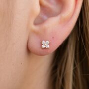 Flat Back Stud Earrings Crystal Flower in F136 Titanium worn on one ear
