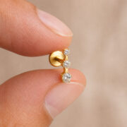 Flat Back Stud Earrings Crystal Trio in F136 Titanium - fingertip scale view