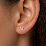 Flat Back Stud Earrings Crystal Butterfly in F136 Titanium - worn on one ear