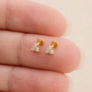 Flat Back Stud Earrings Petite Crystal Cluster in F136 Titanium shown at fingertip scale