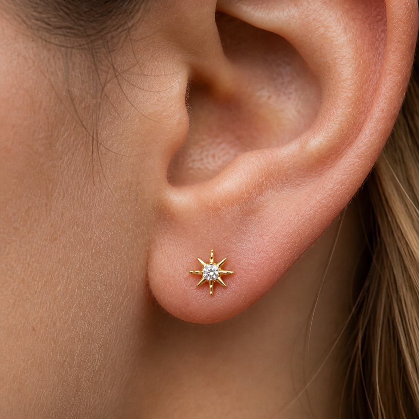Flat Back Stud Earrings Crystal Starburst in F136 Titanium worn on one ear