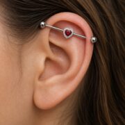 G23 Titanium Heart Crystal Industrial Barbell Earring worn on one ear