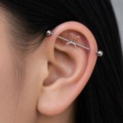 G23 Titanium Bunny Crystal Industrial Barbell Earring worn on one ear