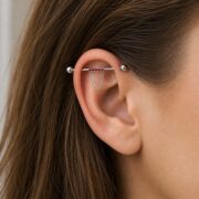 G23 Titanium Double Chain Industrial Barbell Earring worn on one ear
