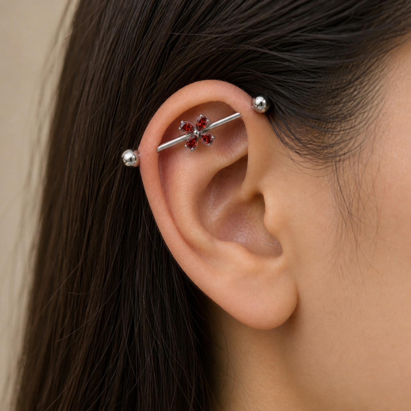G23 Titanium Four-Petal Crystal Industrial Barbell Earring worn on one ear
