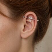 G23 Titanium Marquise Dangle Industrial Barbell Earring in Natural Titanium worn on one ear