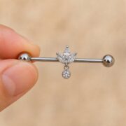 G23 Titanium Marquise Dangle Industrial Barbell Earring in Natural Titanium shown at fingertip scale