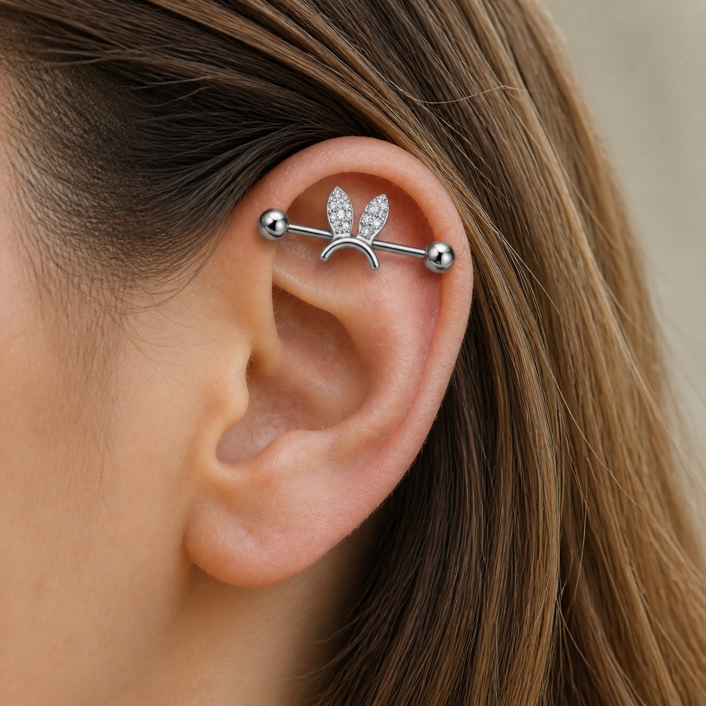 G23 Titanium Bunny Crystal Industrial Barbell Earring in Natural Titanium worn on one ear