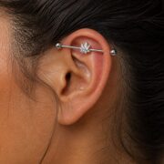 G23 Titanium Maple Leaf Crystal Industrial Barbell Earring in Natural Titanium worn on one ear