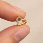 Titanium Flat Back Earrings – Gold Open Heart Zircon Stud - fingertip scale view