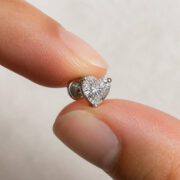 Titanium Flat Back Earrings – Clear Zircon Heart Stud - fingertip scale view