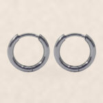Titanium Hoop Earrings Minimal for Sensitive Ears on warm ivory background