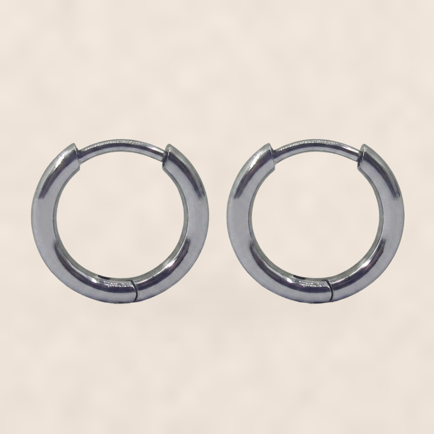 Titanium Hoop Earrings Minimal for Sensitive Ears on warm ivory background
