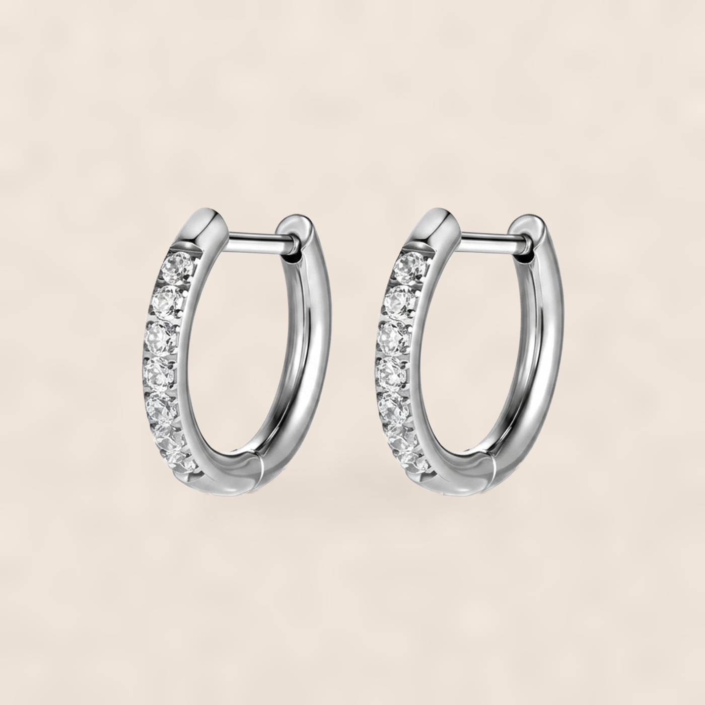 Titanium Hoop Earrings Zircon D-Ring for Sensitive Ears on warm ivory background