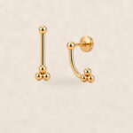 Stud Earrings Trinity Ball Ear Jacket with S925 Silver on warm ivory background