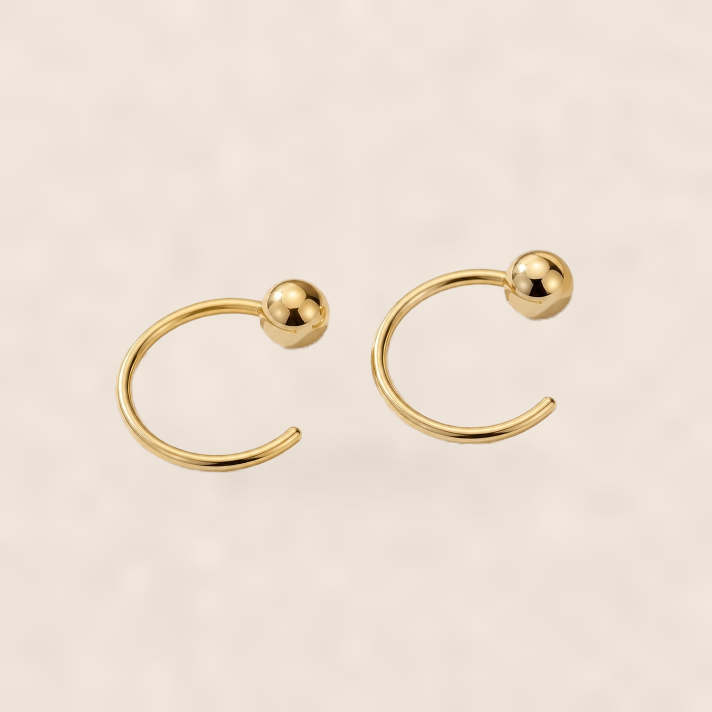 Hypoallergenic Hoop Earrings Ball with S925 Silver on warm ivory background